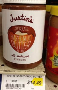 Jar of Justin's chocolate hazelnut butter with price tag showing $14.49