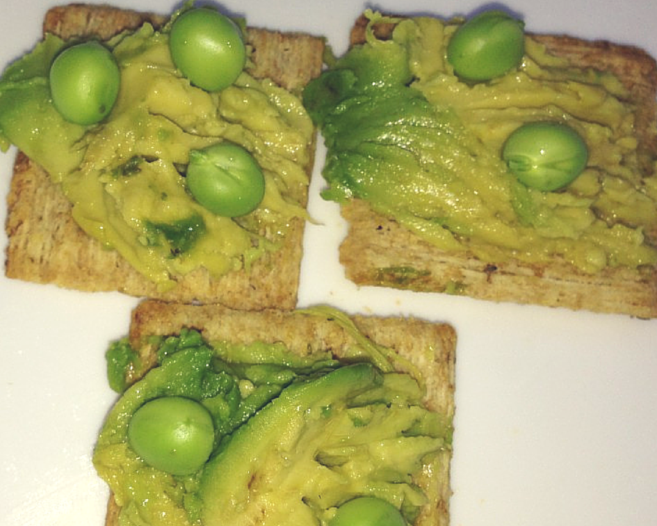 Avocado on Rosemary Crackers with Fresh Peas