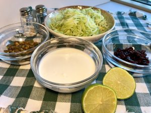 Ingredients for broccoli slaw with cranberries and pistachios
