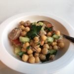 Mediterranean chickpea and tuna salad with chopped cucumber, tomato, parsley and lemon vinaigrette