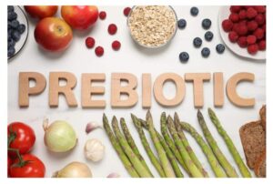 the word prebiotic surrounded by fruits and vegetables